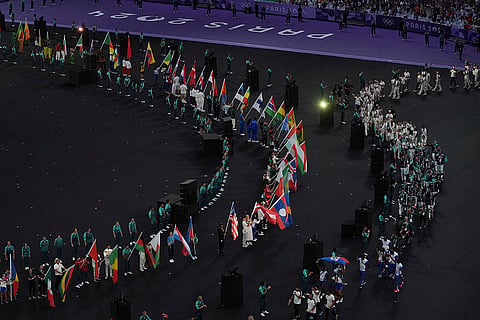 Flag bearers parade during the 2024 Summer Olympics closing ceremony 